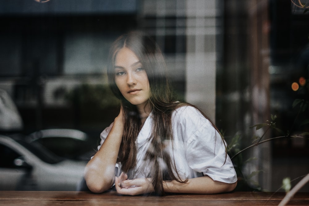 woman posing for photo inside store