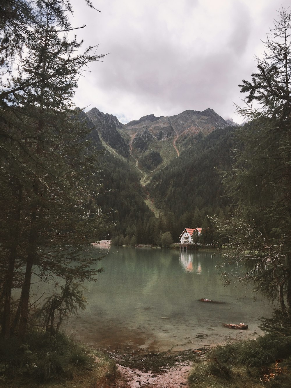 white house under the mountain