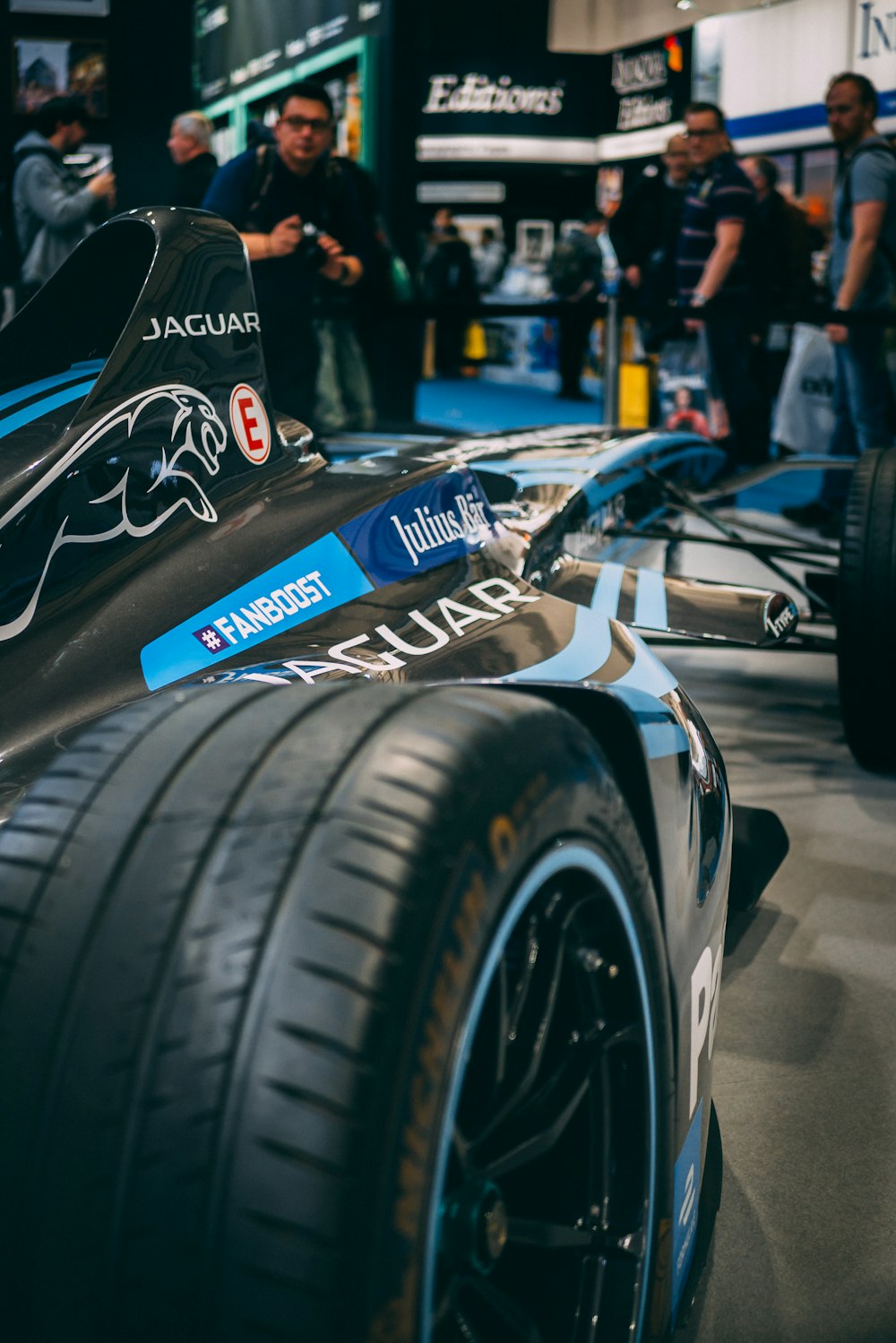 selective focus photography of parked racecar