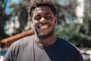 selective focus of man smiling during daytime