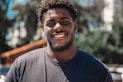 selective focus of man smiling during daytime