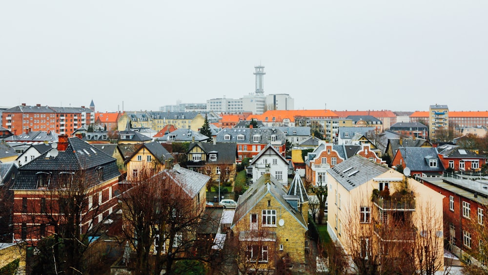 aerial view of brown and yellow house