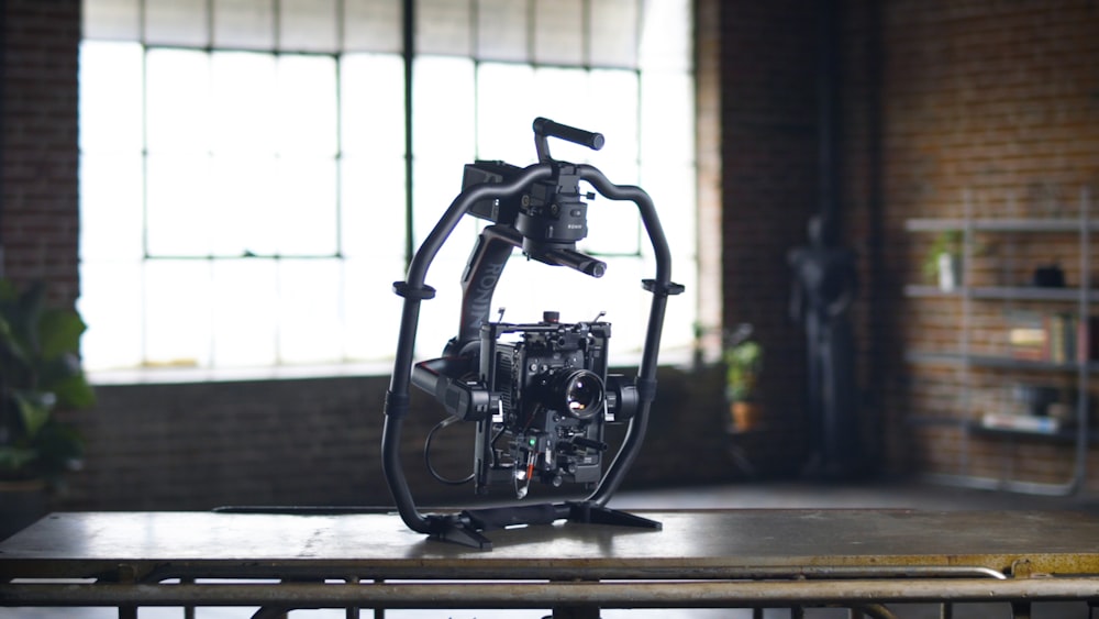 black drone camera on table