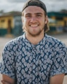 person wearing blue top smiling