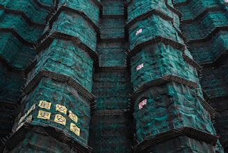 Finished installation of green safety nets blending with the Chennai skyline.