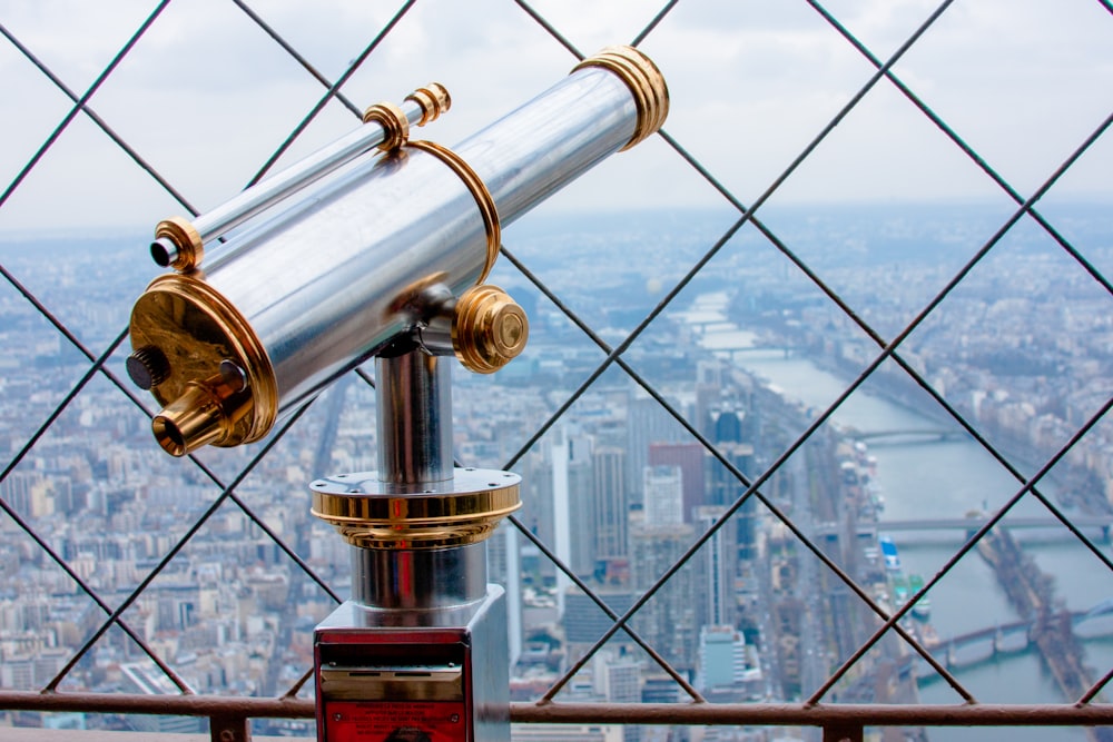 gray and brass-colored tower telescope