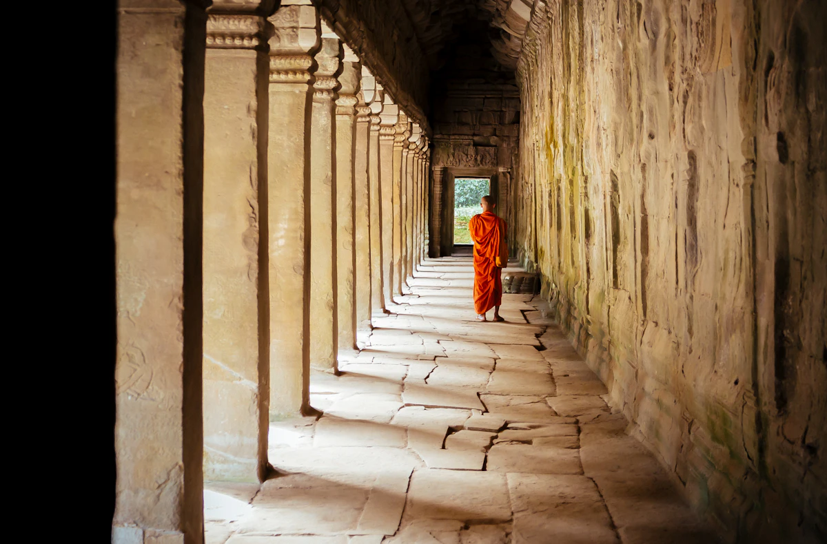 Buddhist monk in orange robe in Cambodia