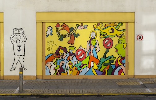 A vibrant mural painted by young artists, full of color and energy.