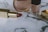 A close-up of elegant cosmetic products arranged on a marble surface.