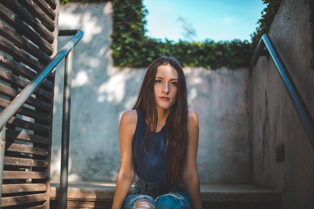 woman sitting on stair