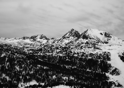 black and white mountain covered with snow andorra teams background