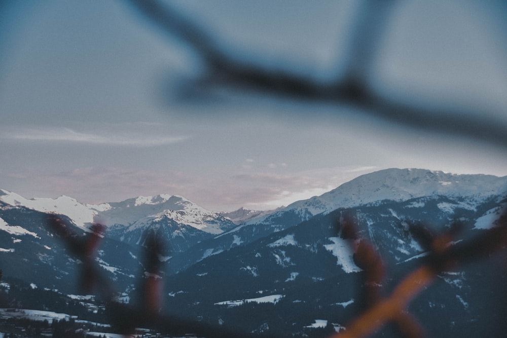 snow capped mountain at daytime under cloudy sky at daytime