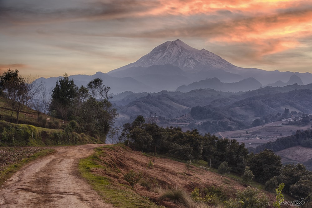 road on mountain leading to mountain