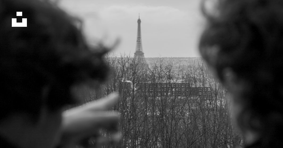 Grayscale photo of man pointing at Eiffel tower photo – Free Portrait ...