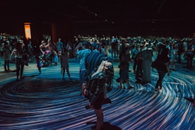 woman standing on floor while looking upward