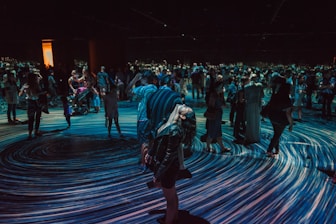 woman standing on floor while looking upward