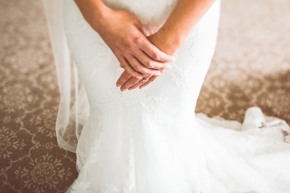woman wearing white bridal gown