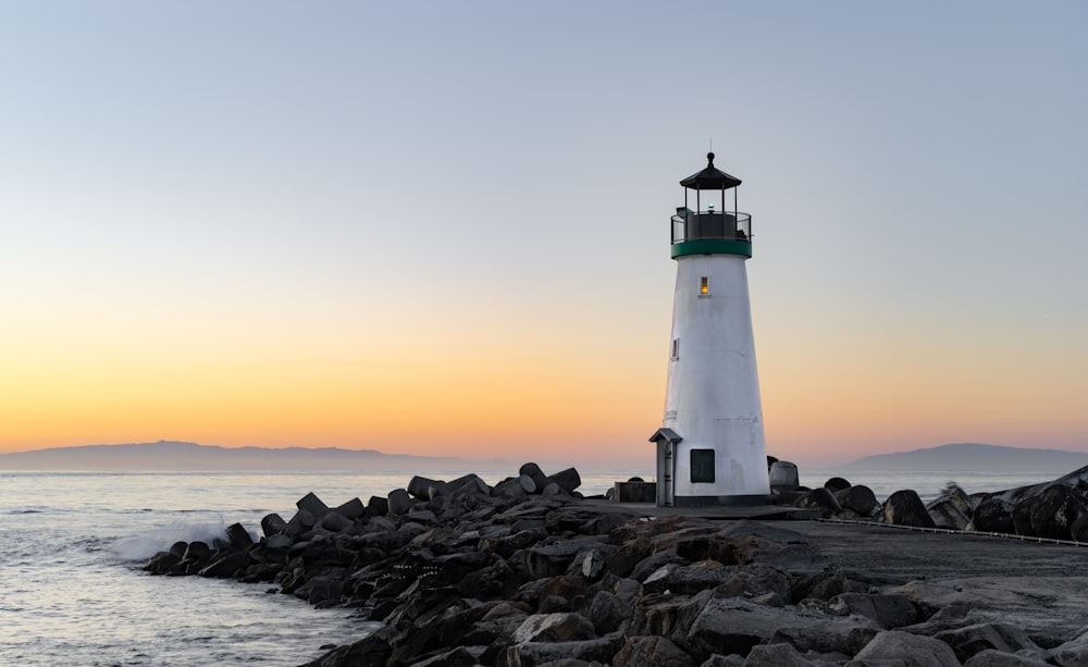 lighthouse near body of water