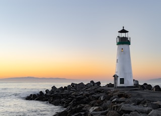 lighthouse near body of water