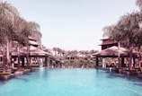An elegant infinity pool overlooking a tropical landscape.