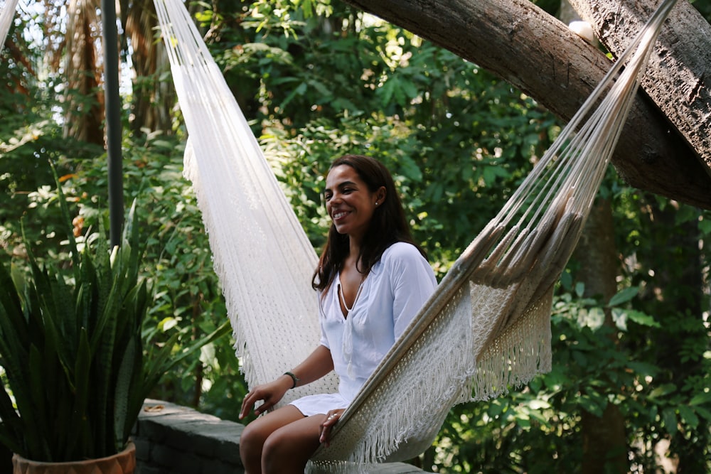 woman sitting on hammock