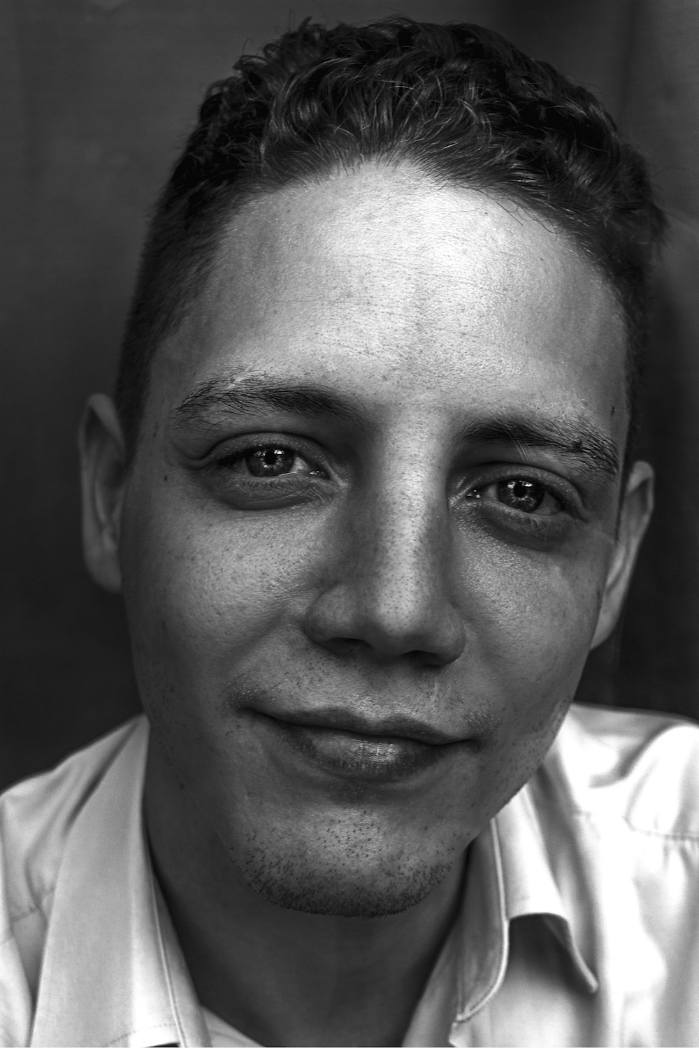 grayscale photography of man's face