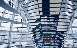 Interior view of an office building on Avenida Paulista with people walking.
