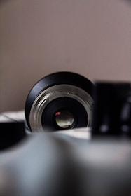Close-up of a camera lens focusing on a special occasion.