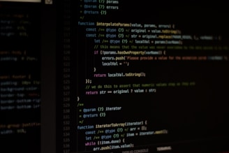 Computer screen displaying lines of code written in a dark-themed code editor. The code features syntax highlighting with text in various colors for different programming elements.