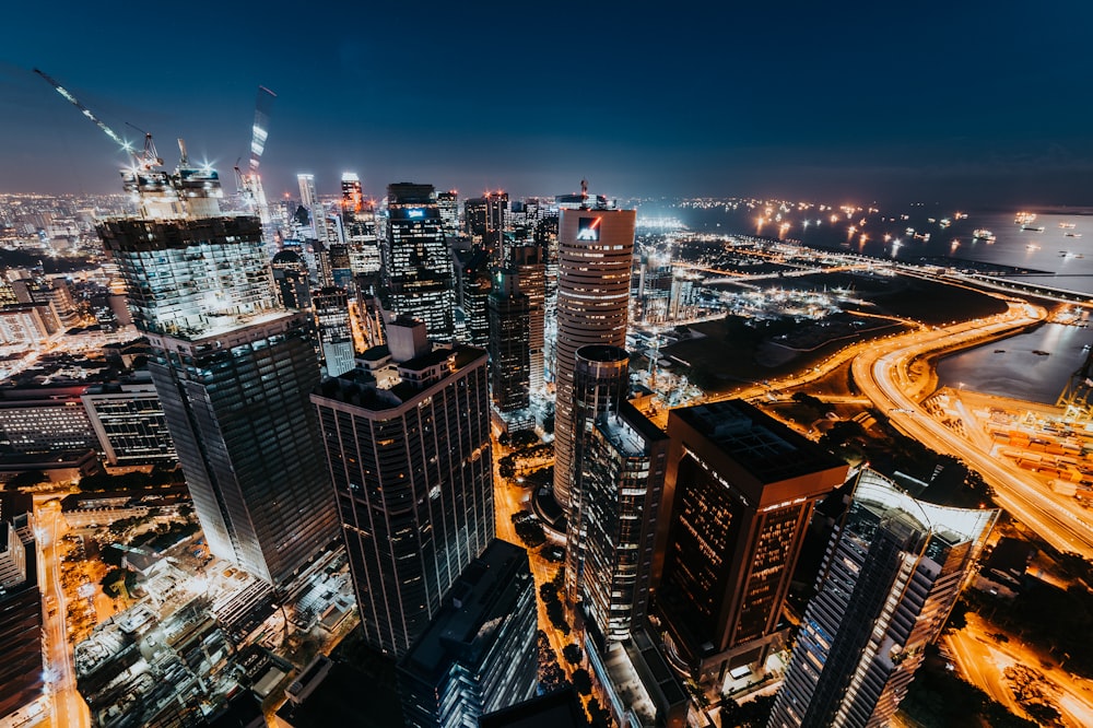 bird's eye and timelapse photography of city skyline