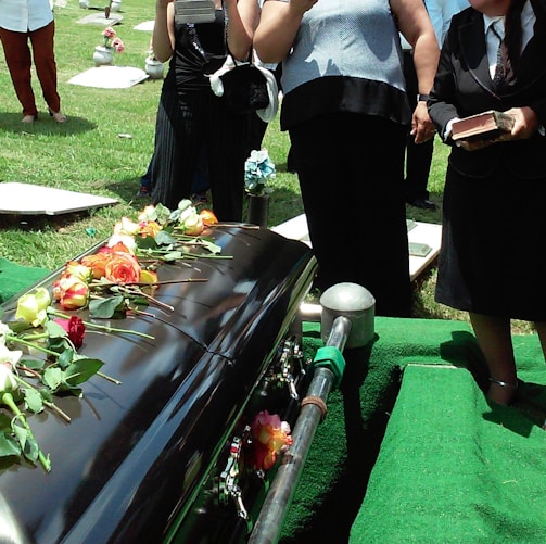 group of people attending burial