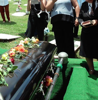 group of people attending burial