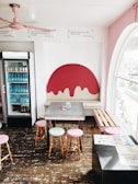 Bright and cheerful interior of bit & bytes with pastel walls and playful ice cream illustrations.