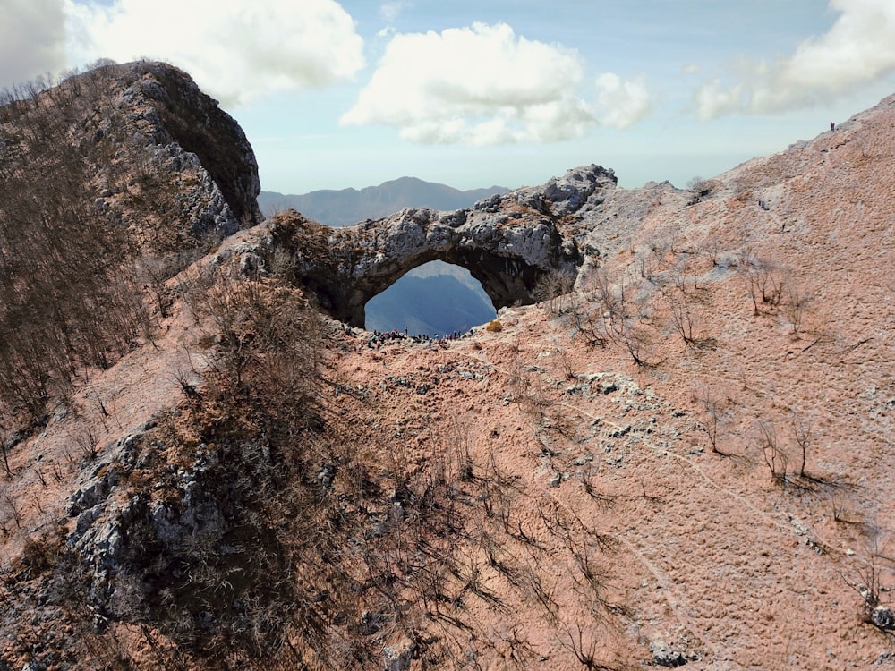 group of people on top of mountain during daytime