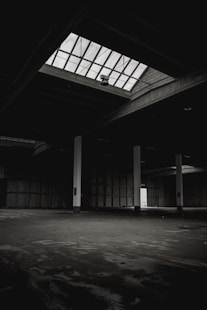 selective focus photography of white and black building