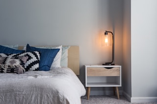 black table lamp on nightstand