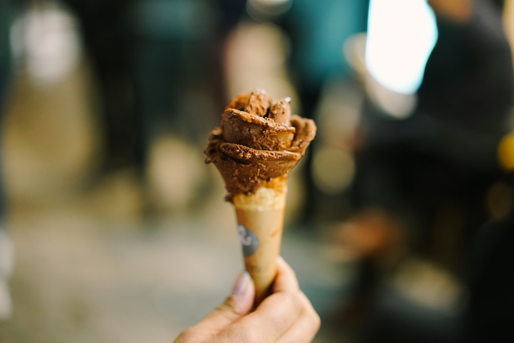 selective focus photography of ice cream cone
