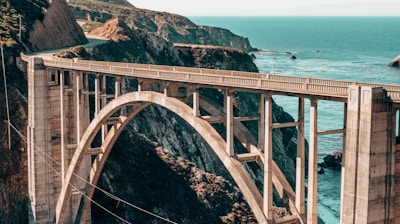 landscape photography of gray concrete bridge