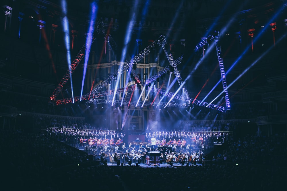 people playing musical instruments on stage