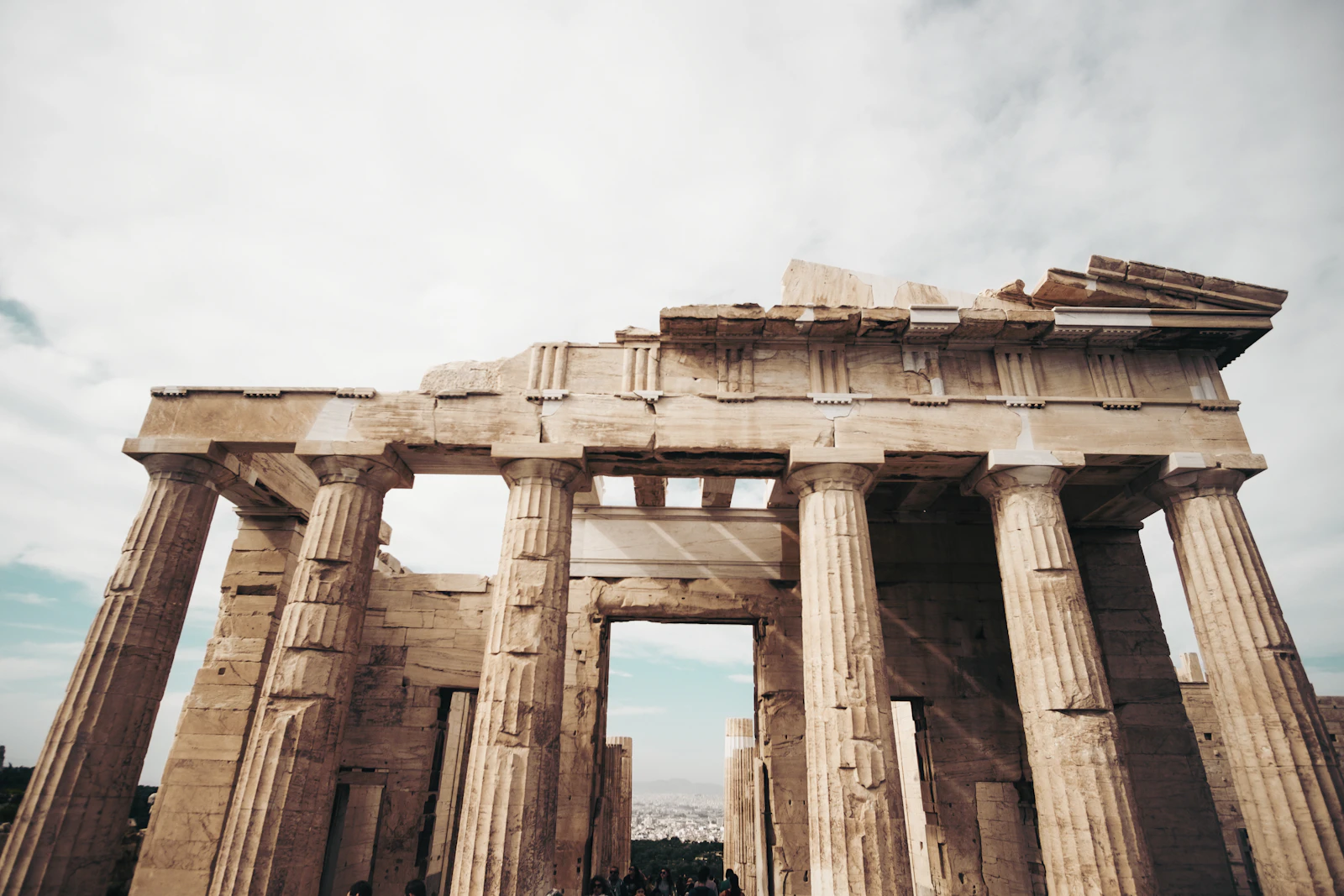 Worm's eye view of the ancient Greek Parthenon under bright sky
