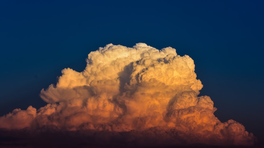 pelean eruption under blue sky