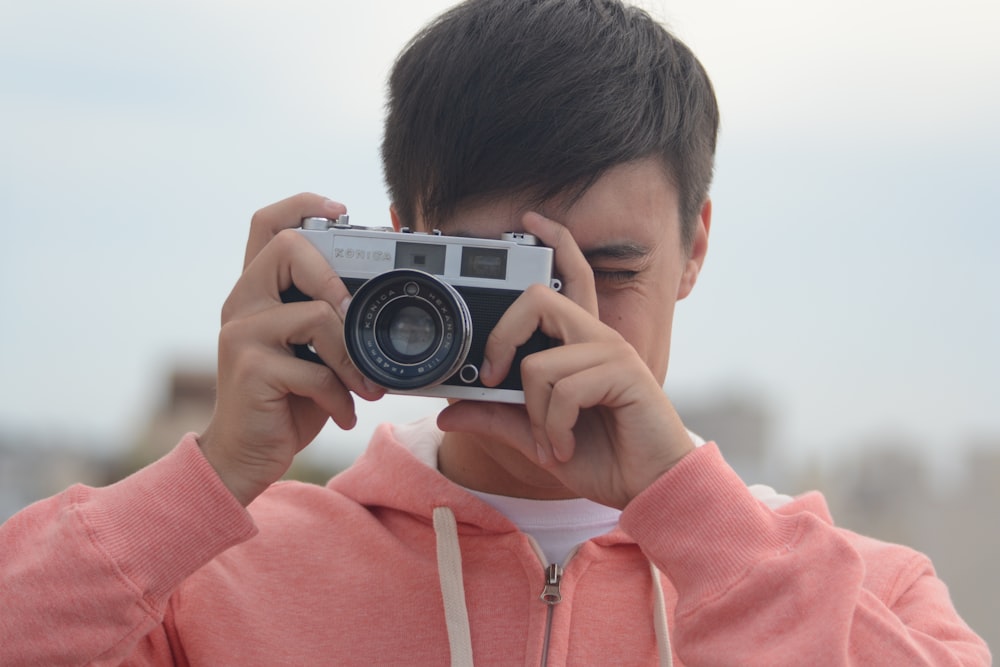 man holding camera