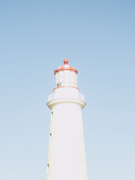 white concrete lighthouse in Faro de Punta del Este Uruguay