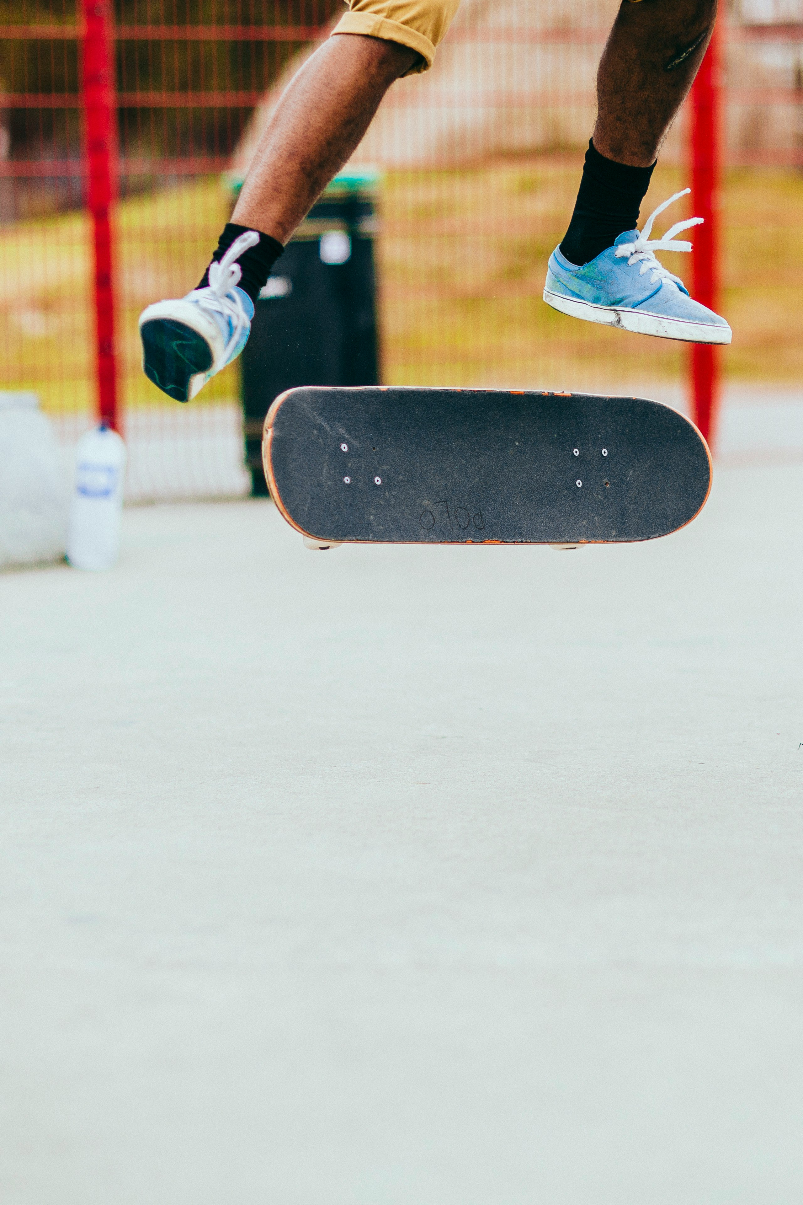 man playing skateboard while performing flip tricks