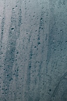An infographic depicting the process of condensation on a cold surface.