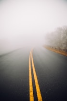 foggy gray concrete road