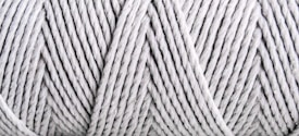 Close-up view of tightly wound, light gray yarn with visible texture and patterns formed by the twisted strands.