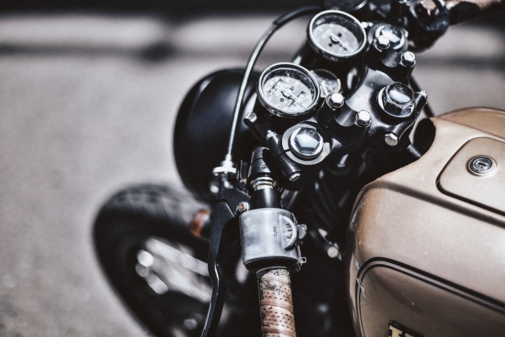 a close up of a motorcycle parked on the street