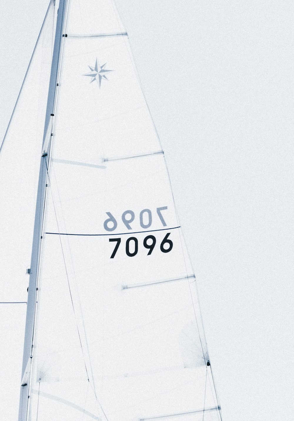 a sailboat with a number on the side of it