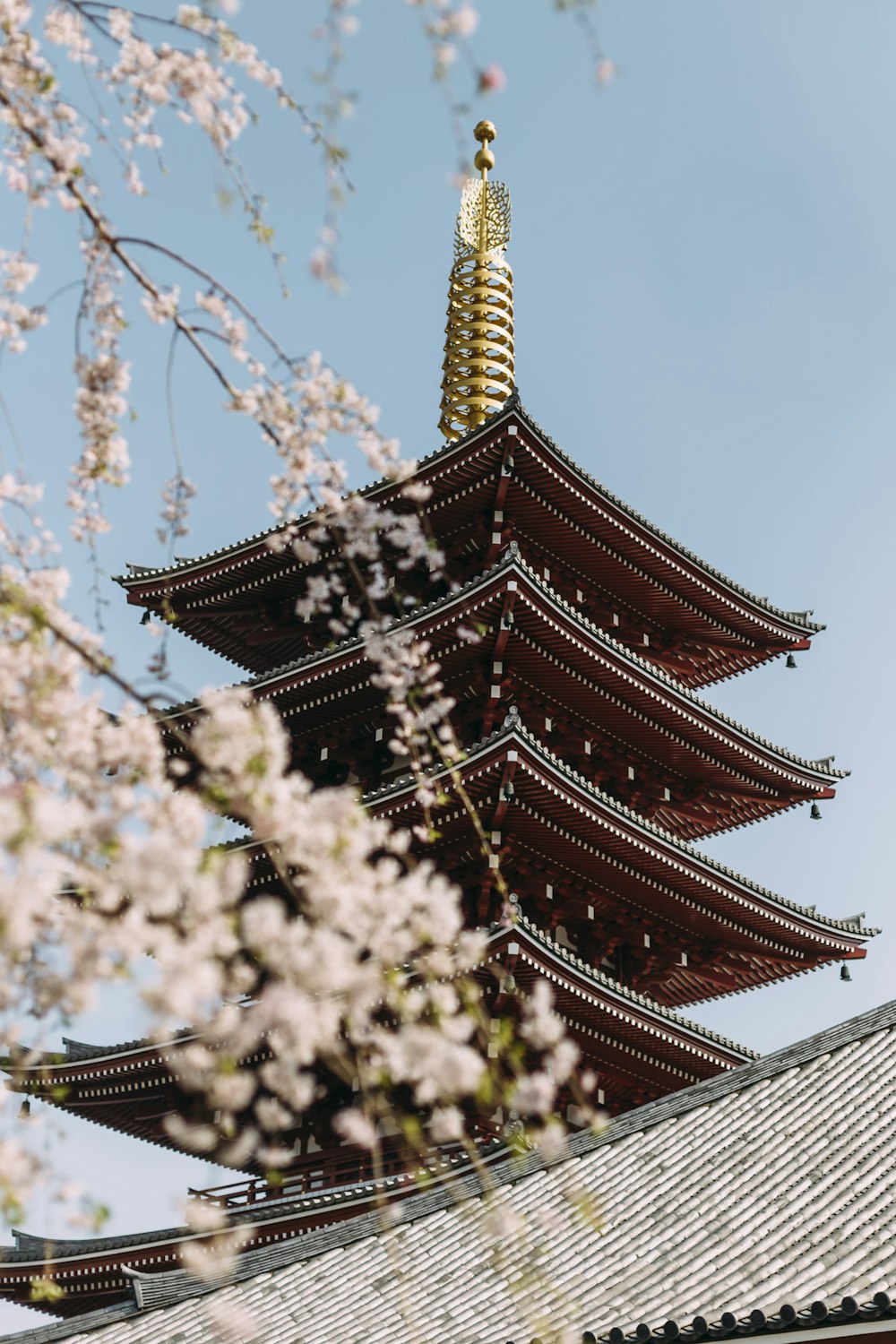 red and brown tower at daytime